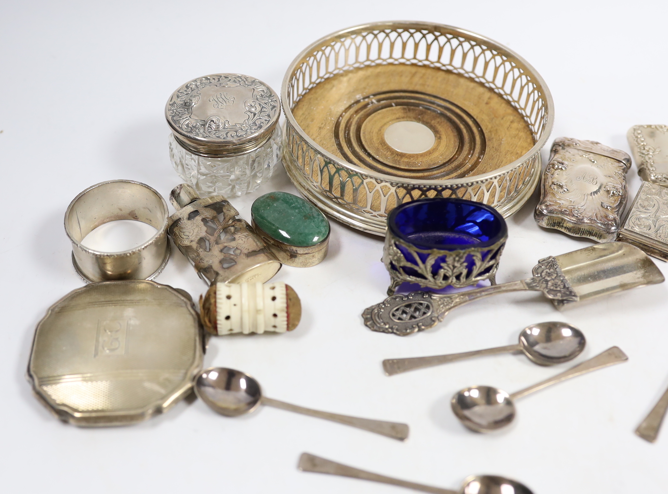 A modern silver mounted wine coaster, a silver compact, two vesta cases, an early Victorian silver vinaigrette, Taylor & Perry, Birmingham, 1839, 40mm, six silver coffee spoons and other sundry silver or white metal item